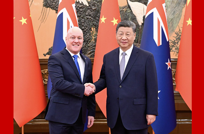 习近平会见新西兰总理拉克森
