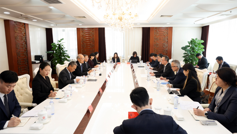 张军会见香港律政司司长林定国